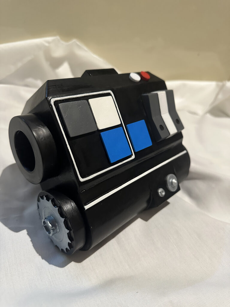 Black and blue sci-fi control panel prop viewed from the side